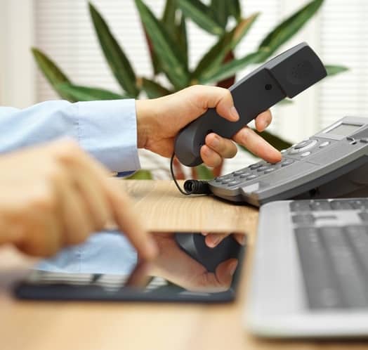 Man's Finger On Phone And Tablet