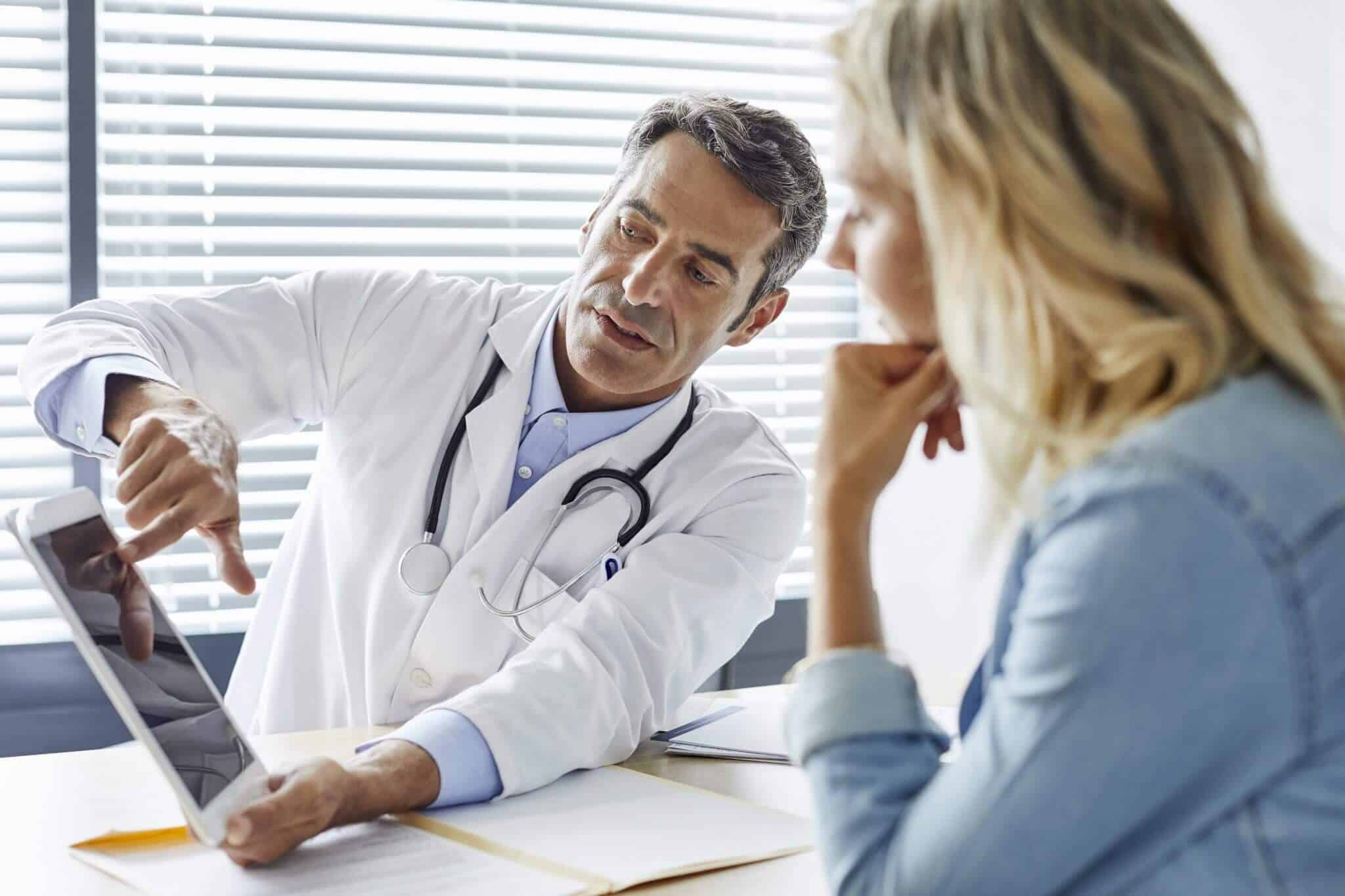 How to Prepare for Your CT Scan | patient consulting with doctor | blog article by Catalina Imaging