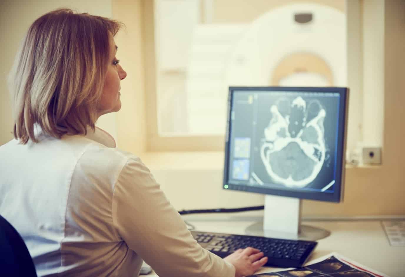 Doctor Reading Catalina Imaging Cat Scan On Computer